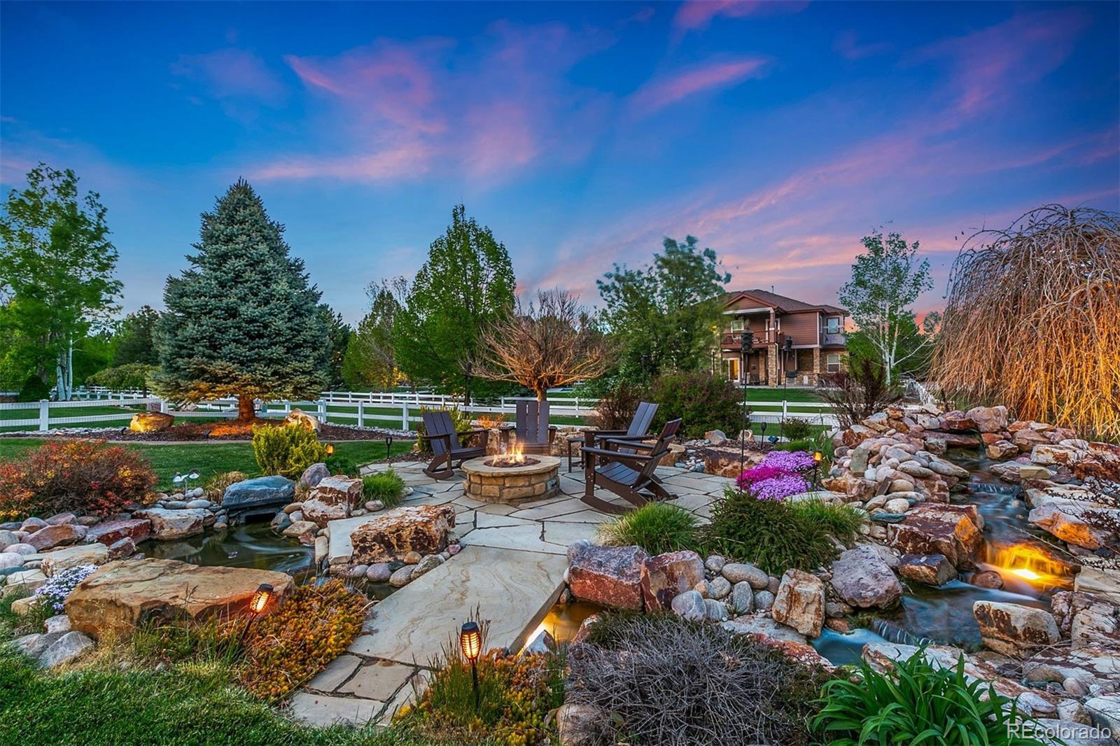 8440 Spinnaker Bay Drive Windsor, CO 80528 - Photo 34 of 36 a view of a swimming pool with a patio