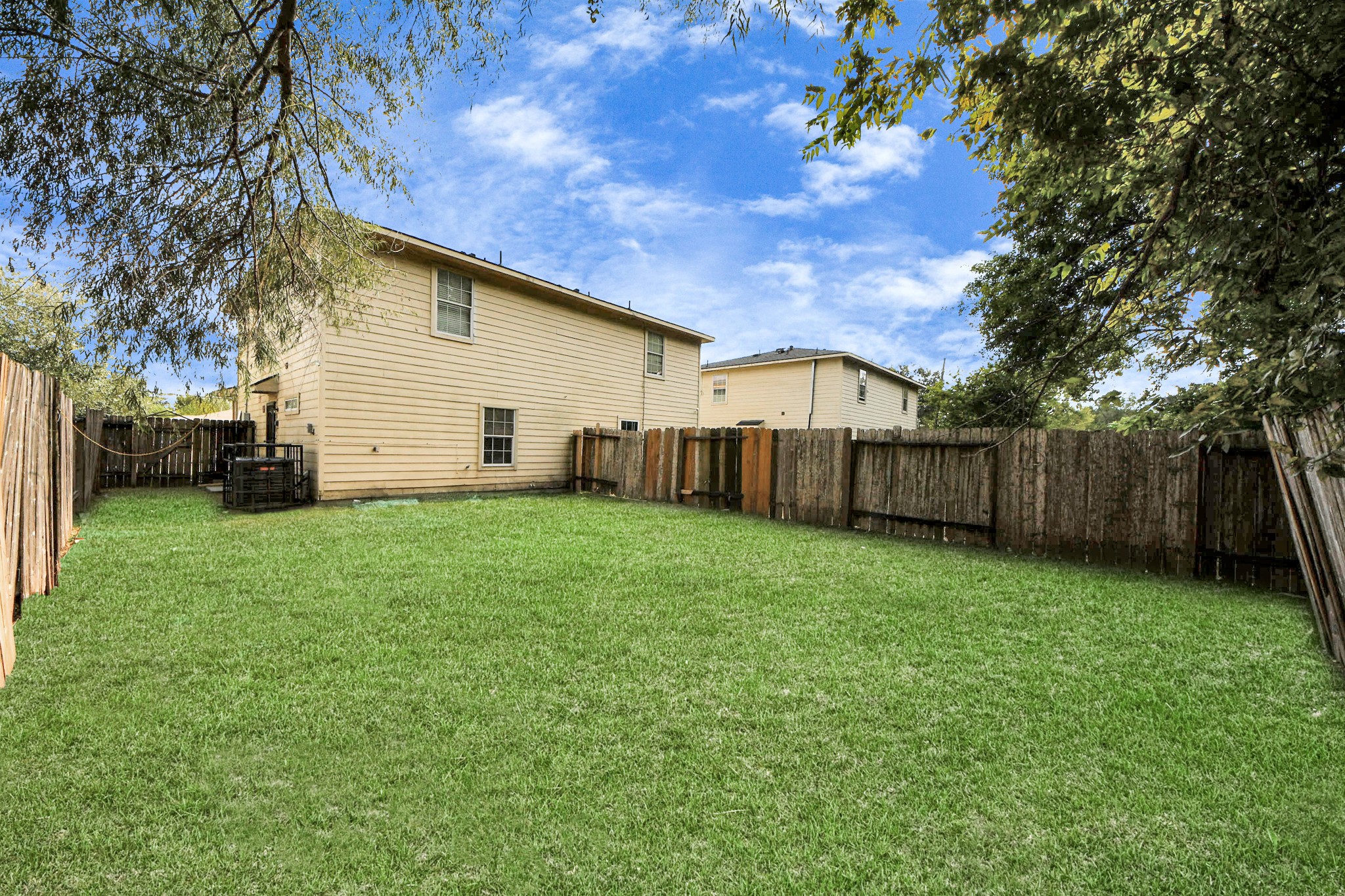 8126 Jutland Road Houston, TX 77033 - Photo 43 of 46 a view of a backyard with a garden