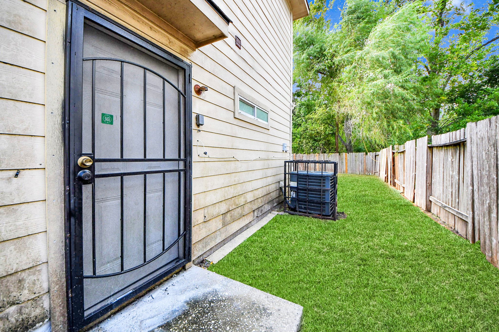 8126 Jutland Road Houston, TX 77033 - Photo 46 of 46 a view of a backyard with wooden fence