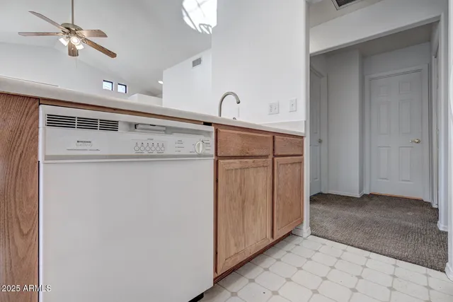 a view of a storage & utility room with a sink