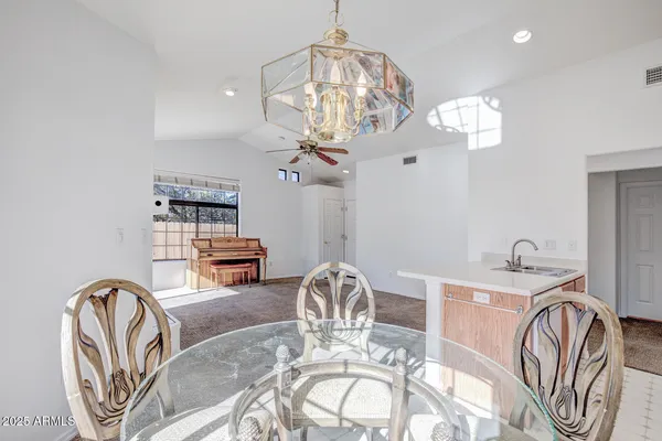 a view of a dining room with furniture