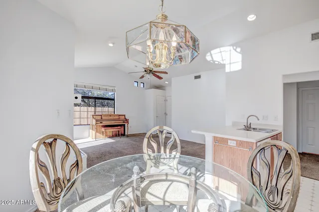 a view of a dining room with furniture