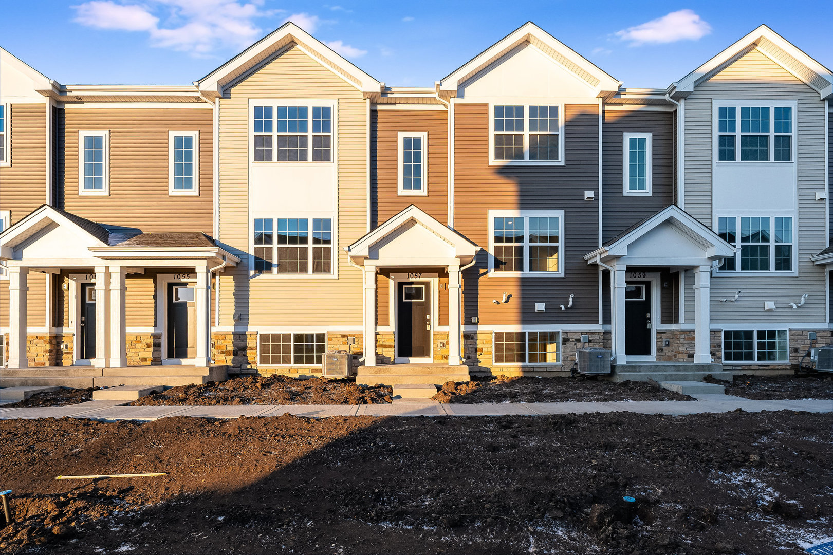 1057 Briar Gln Court Hampshire, IL 60140 - Photo 1 of 1 a front view of a house with a yard