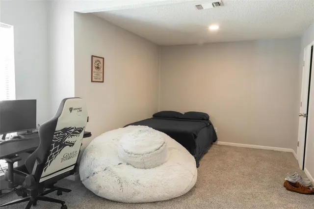 a view of a livingroom with furniture