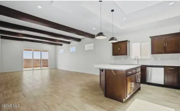 a kitchen with stainless steel appliances granite countertop a stove and a sink