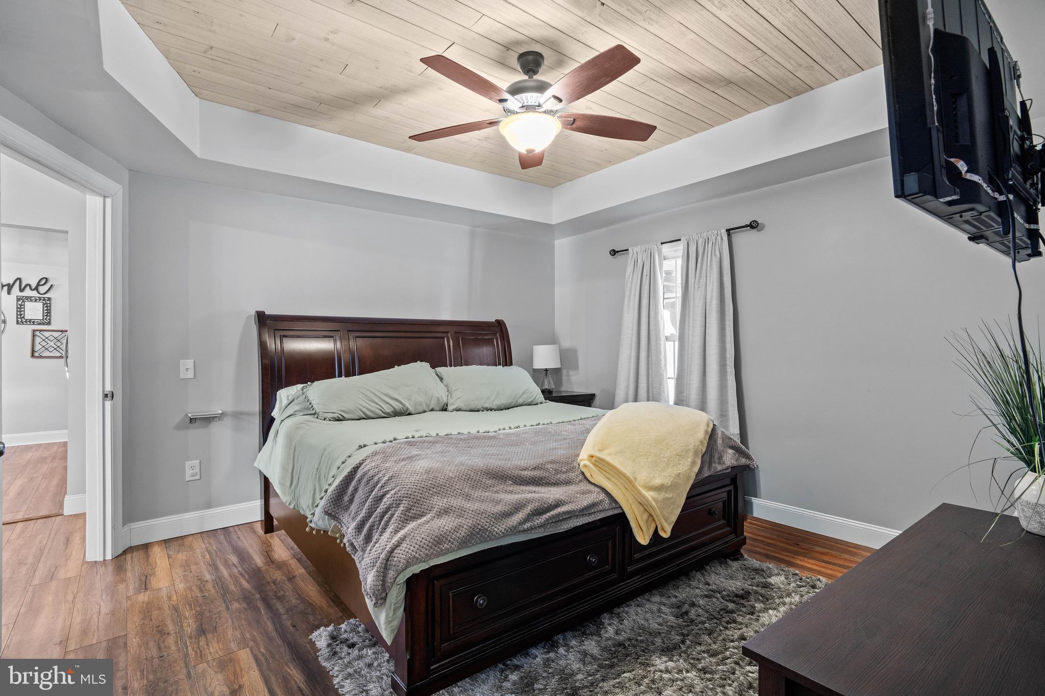 197 Ridge Street Smokerun, PA 16681 - Photo 21 of 47 a bedroom with a bed and a ceiling fan