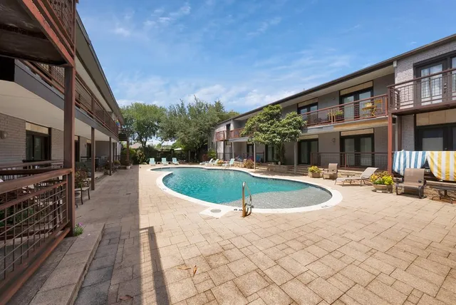 a view of a hallway view with staircase