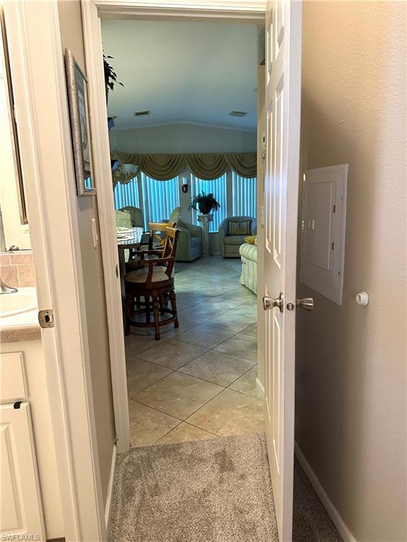 4730 Lantern Lane West Estero, FL 33928 - Photo 15 of 22 a view of living room with furniture and a window