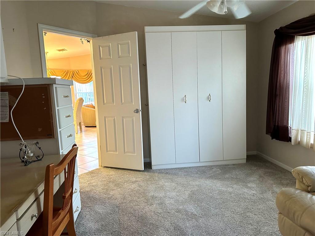 4730 Lantern Lane West Estero, FL 33928 - Photo 17 of 22 a view of a livingroom with bathroom and a window