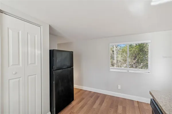 a view of a hallway with a white walls