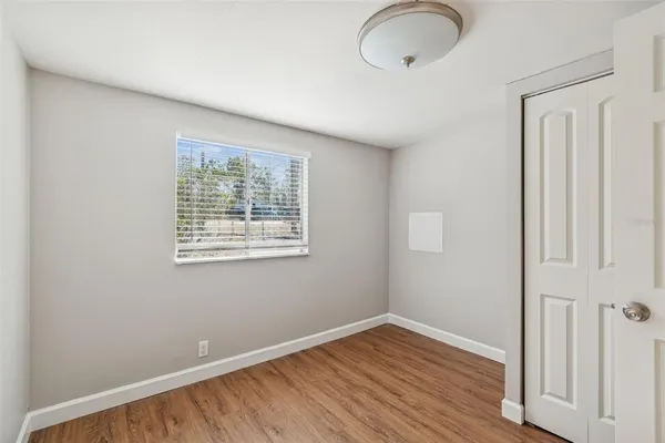 a view of entryway with wooden floor