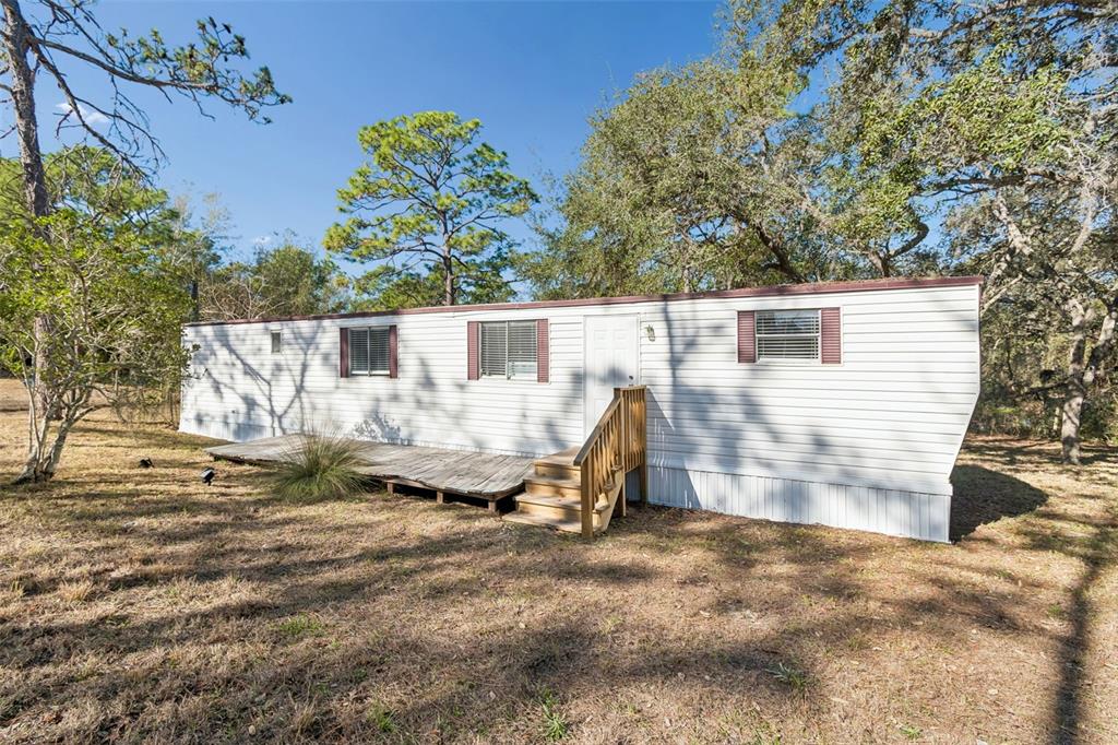 5464 South Wilson Point Homosassa, FL 34446 - Photo 35 of 39 a view of a small space in the backyard of a house
