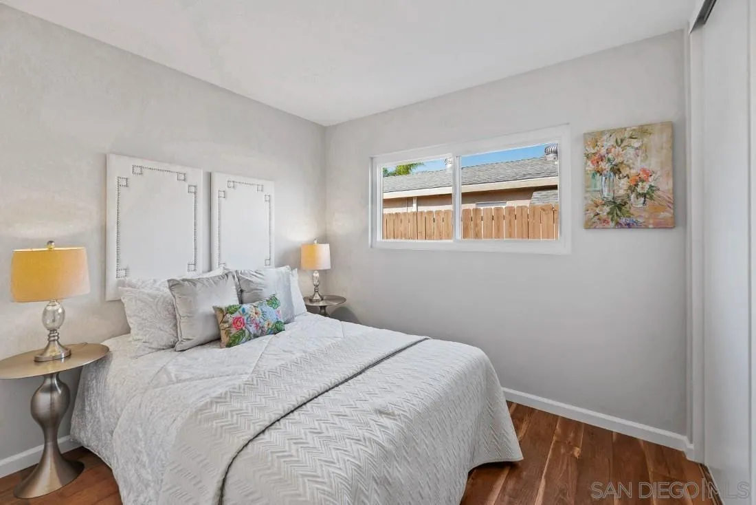1445 Ronda Place Escondido, CA 92027 - Photo 11 of 15 a bedroom with a bed and a window