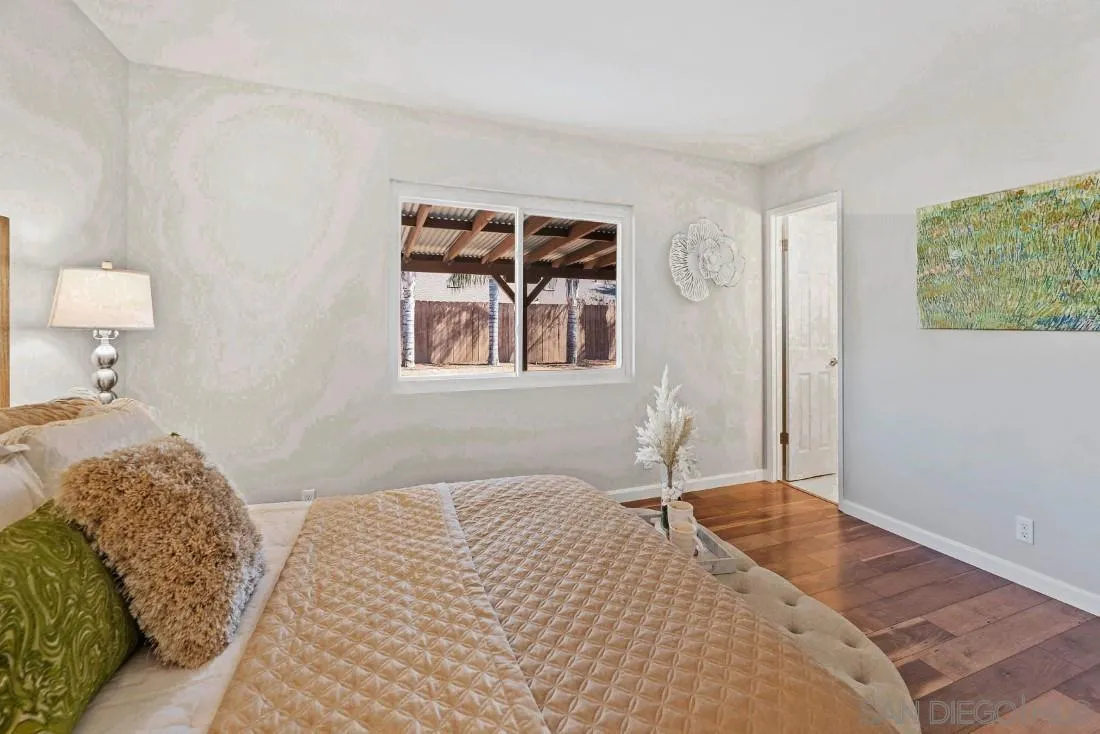 1445 Ronda Place Escondido, CA 92027 - Photo 9 of 15 a bedroom with a bed and a window