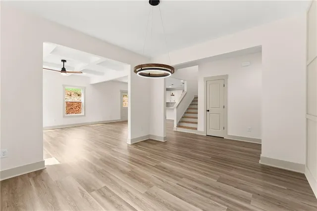 a view of a livingroom with wooden floor