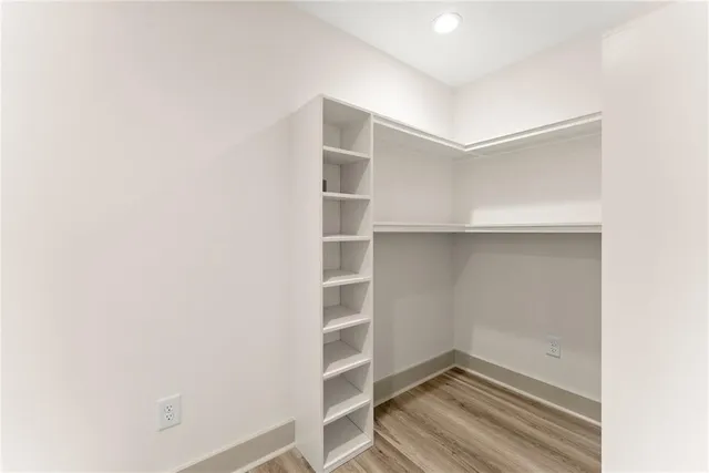 a view of an empty walk in closet