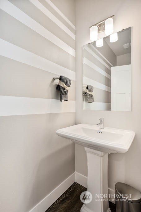 21535 6th Drive Southeast, Unit RM15 Bothell, WA 98021 - Photo 26 of 26 a bathroom with a sink and a mirror