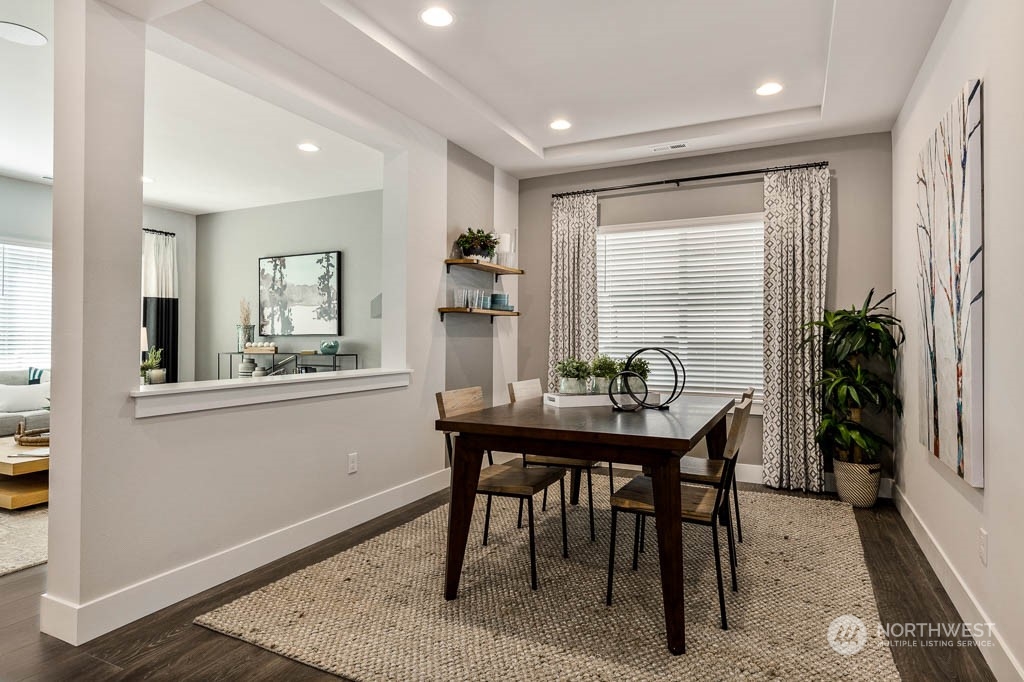 21535 6th Drive Southeast, Unit RM15 Bothell, WA 98021 - Photo 10 of 26 a view of a dining room with furniture and window