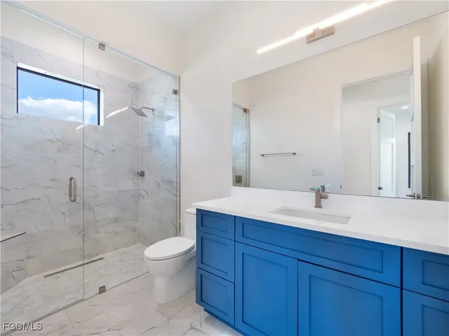 a view of a house with a yard and garage