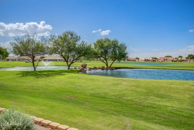 a room with gym equipment and lots of wooden furniture