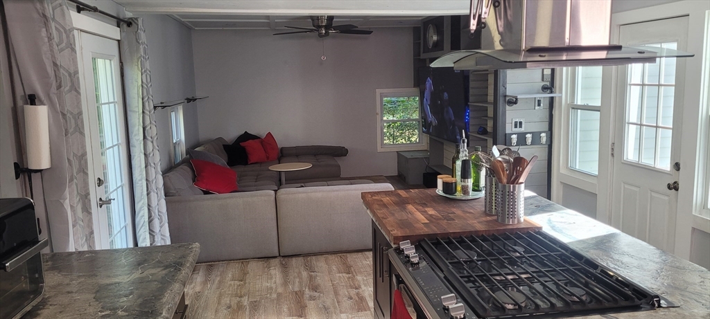 123 West River Road Hooksett, NH 03106 - Photo 13 of 40 a living room with furniture and a window