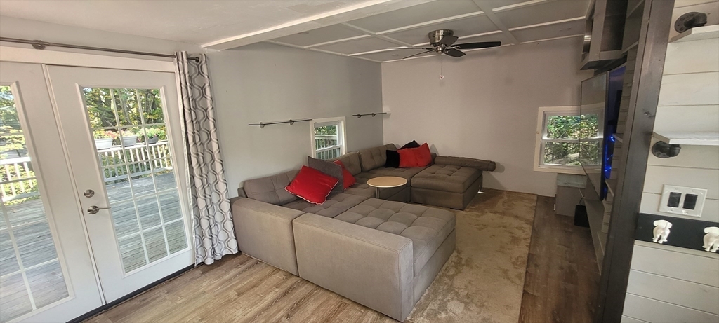 123 West River Road Hooksett, NH 03106 - Photo 16 of 40 a living room with furniture and a window