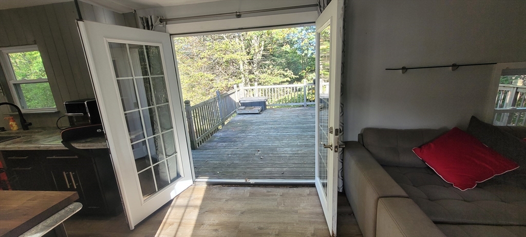 123 West River Road Hooksett, NH 03106 - Photo 17 of 40 a living room with furniture and a window