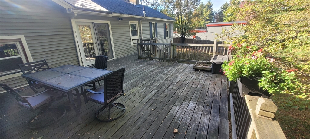 123 West River Road Hooksett, NH 03106 - Photo 18 of 40 a deck view with a seating space