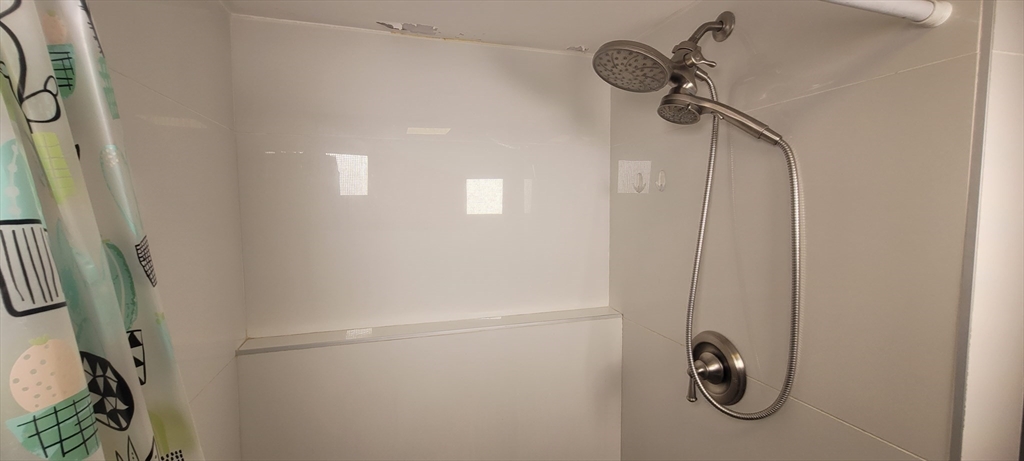 123 West River Road Hooksett, NH 03106 - Photo 25 of 40 a bathroom with a shower