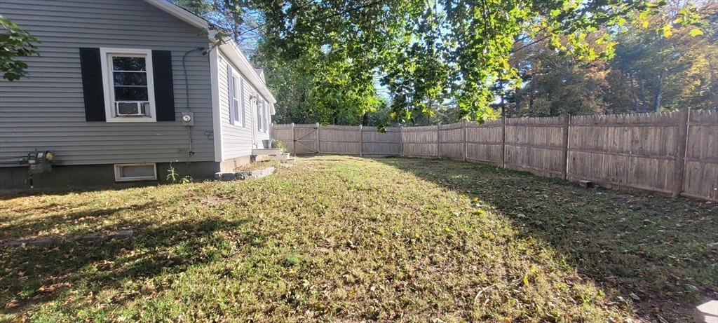 123 West River Road Hooksett, NH 03106 - Photo 3 of 40 a backyard of a house