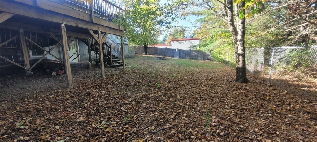 123 West River Road Hooksett, NH 03106 - Photo 35 of 40 a view of a yard with a tree