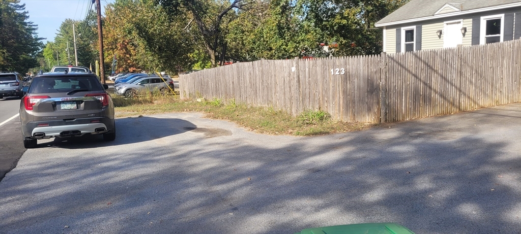 123 West River Road Hooksett, NH 03106 - Photo 39 of 40 a view of a backyard with swimming pool