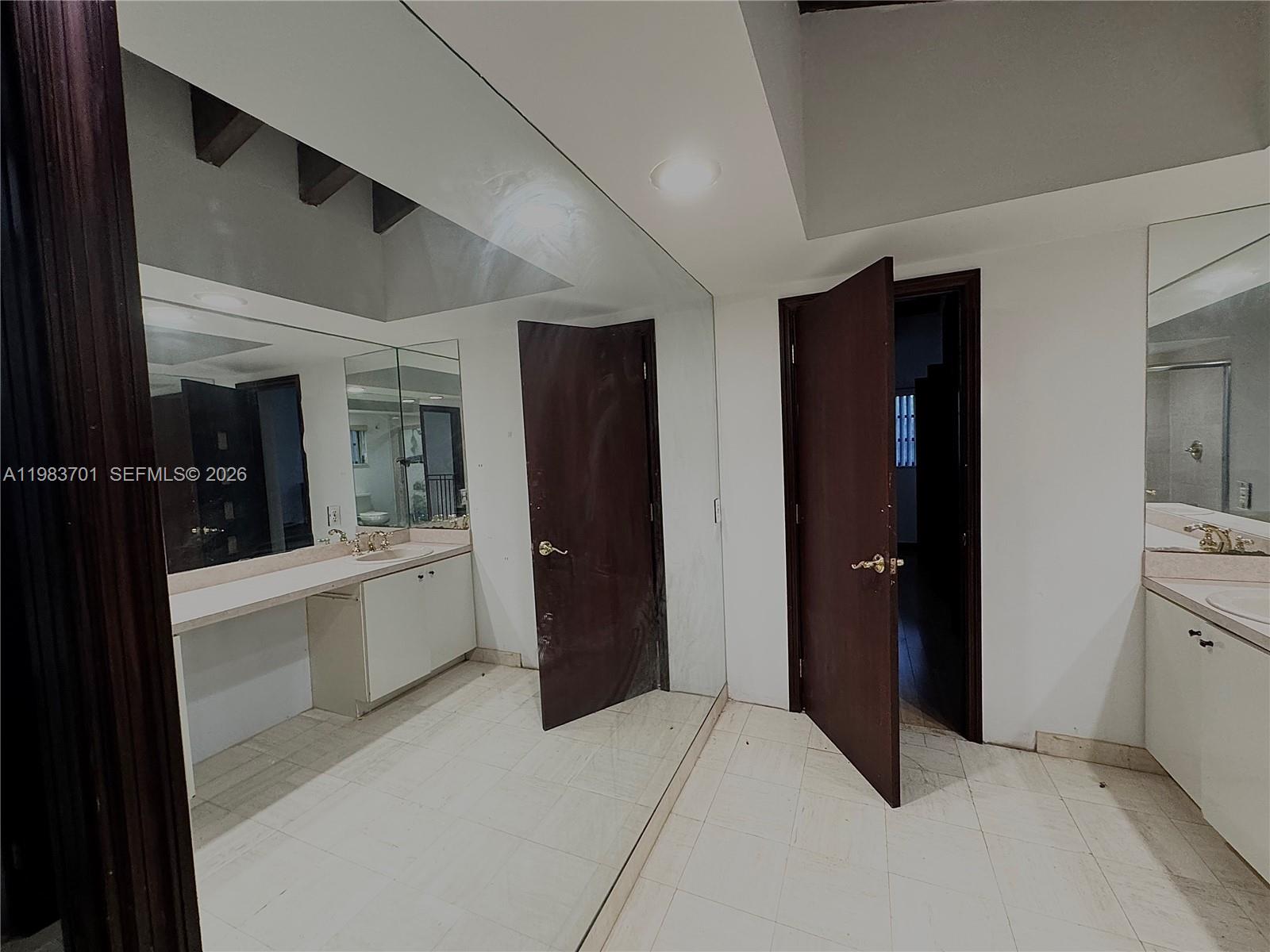 3911 Farragut Street Hollywood, FL 33021 - Photo 18 of 26 a room with closet and windows