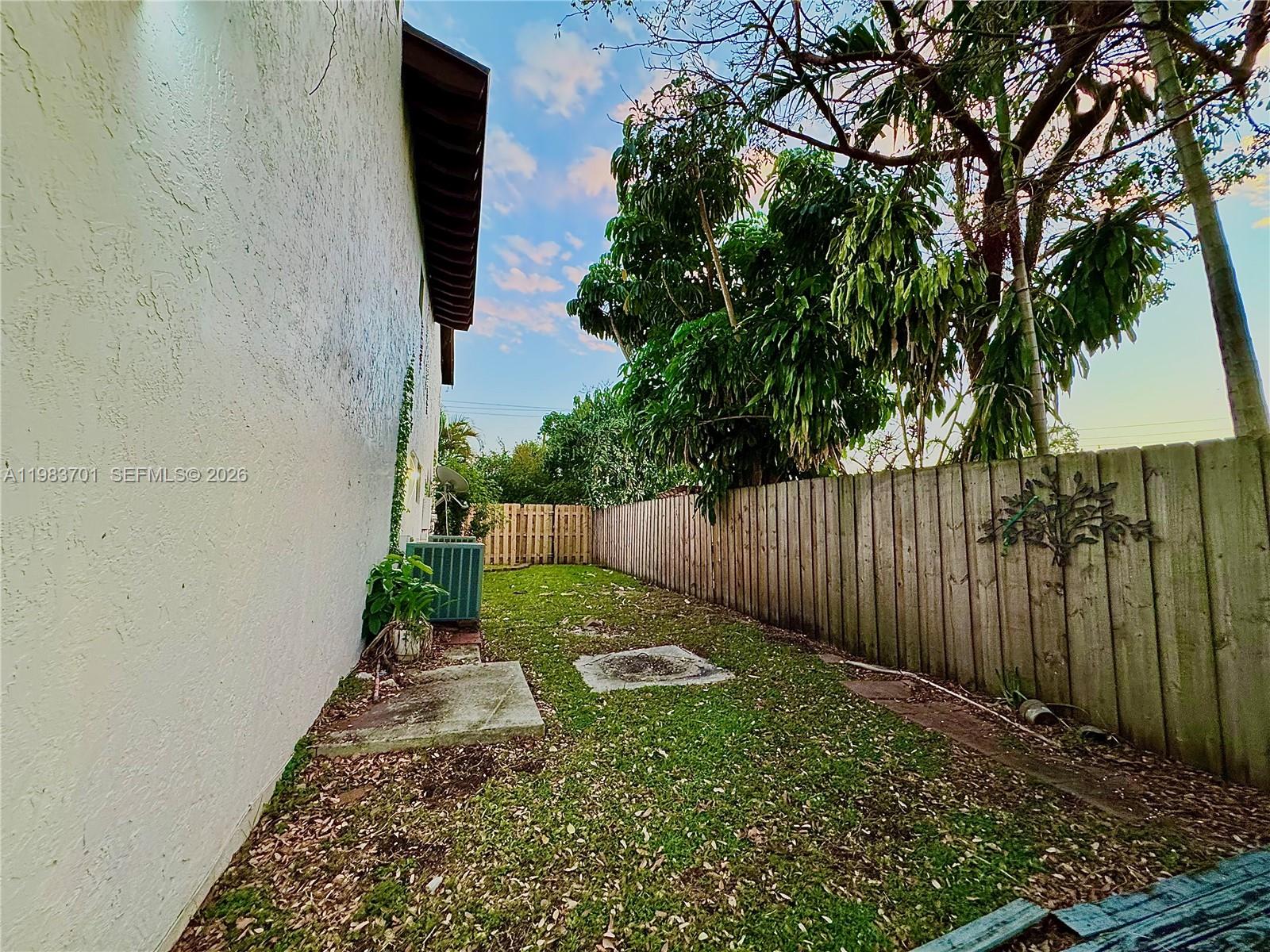 3911 Farragut Street Hollywood, FL 33021 - Photo 24 of 26 a view of garden