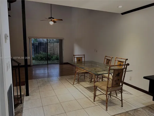 a workspace with furniture and window