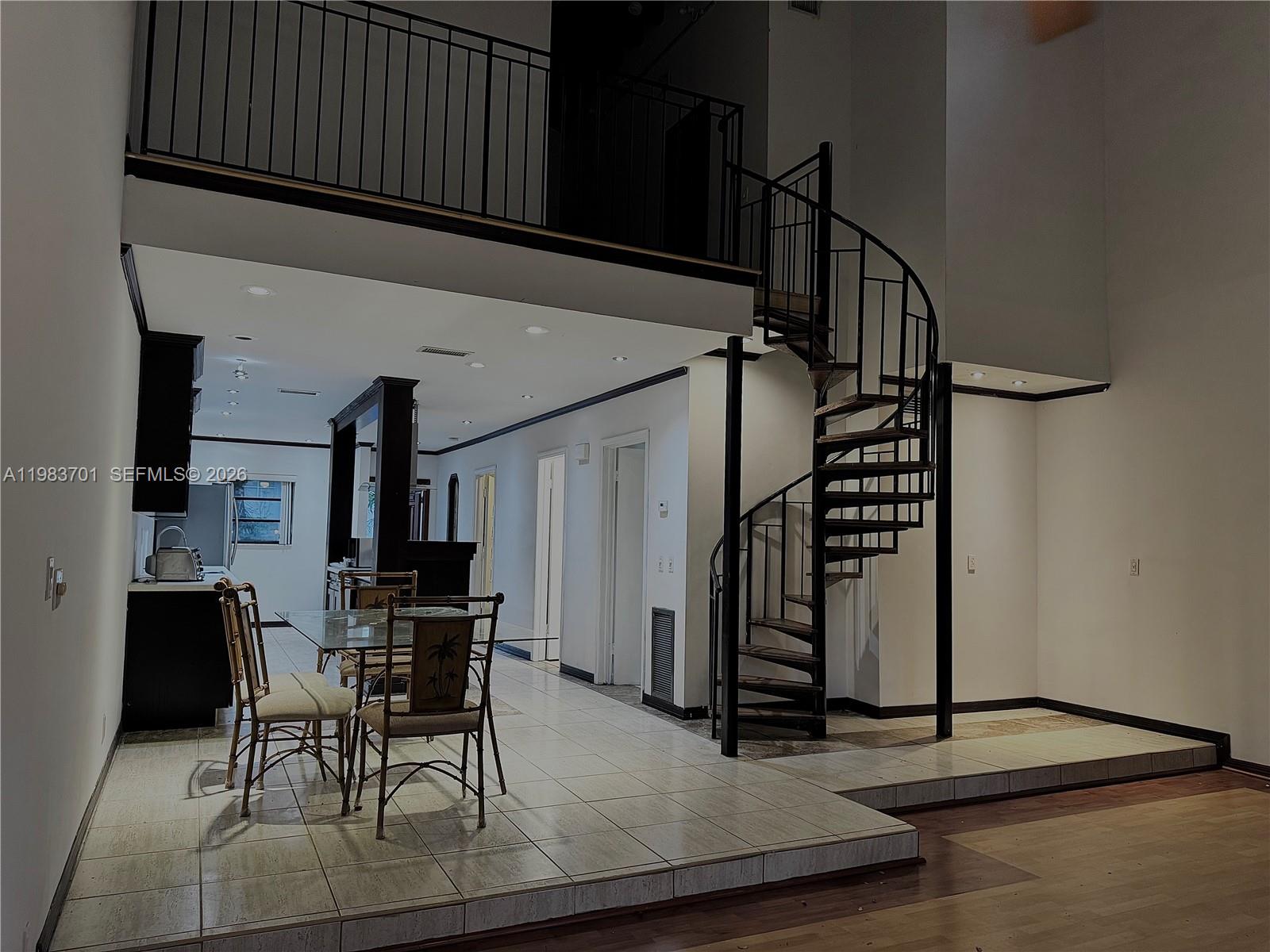 3911 Farragut Street Hollywood, FL 33021 - Photo 8 of 26 a view of entryway with workspace and stairs