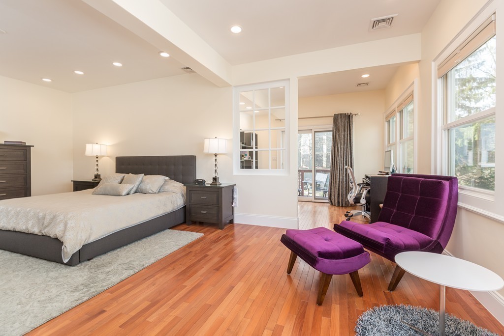 152 Winthrop Road, Unit 2 Brookline, MA 02445 - Photo 12 of 28 a spacious bedroom with a bed a couch and dresser