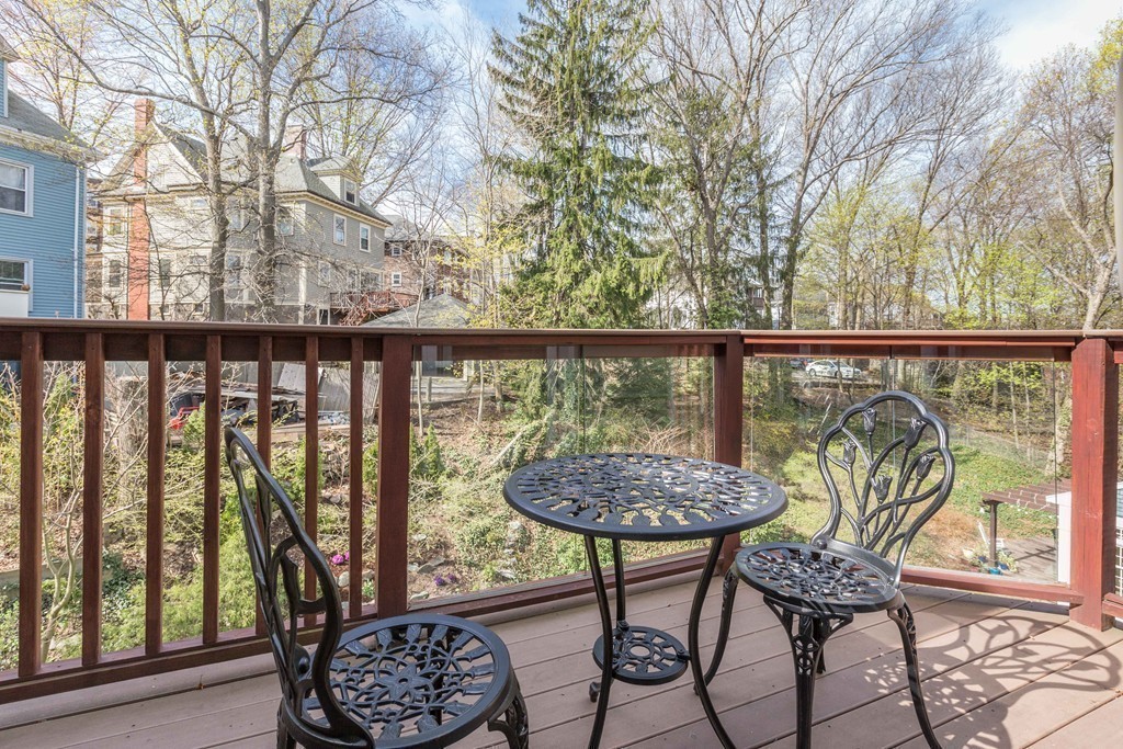 152 Winthrop Road, Unit 2 Brookline, MA 02445 - Photo 15 of 28 a view of a chair and table in patio