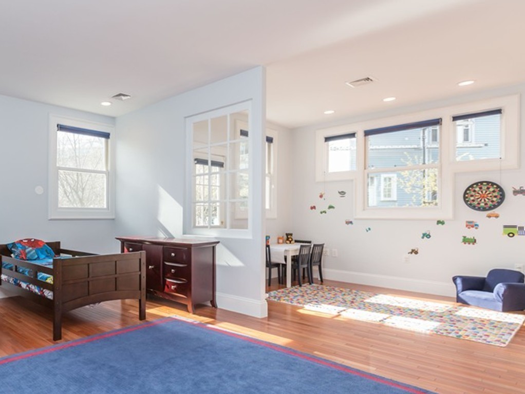 152 Winthrop Road, Unit 2 Brookline, MA 02445 - Photo 20 of 28 a view of a livingroom with furniture and window