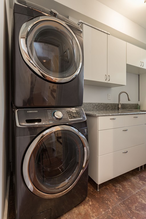 152 Winthrop Road, Unit 2 Brookline, MA 02445 - Photo 24 of 28 a utility room with sink dryer and washer