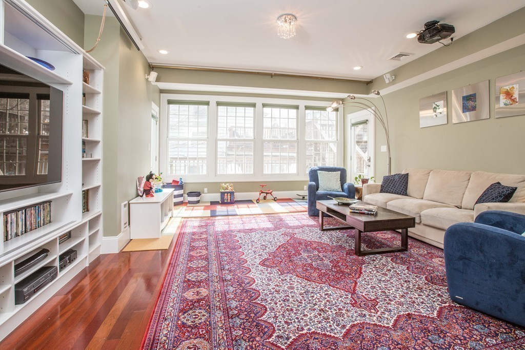 152 Winthrop Road, Unit 2 Brookline, MA 02445 - Photo 9 of 28 a living room with furniture and a rug