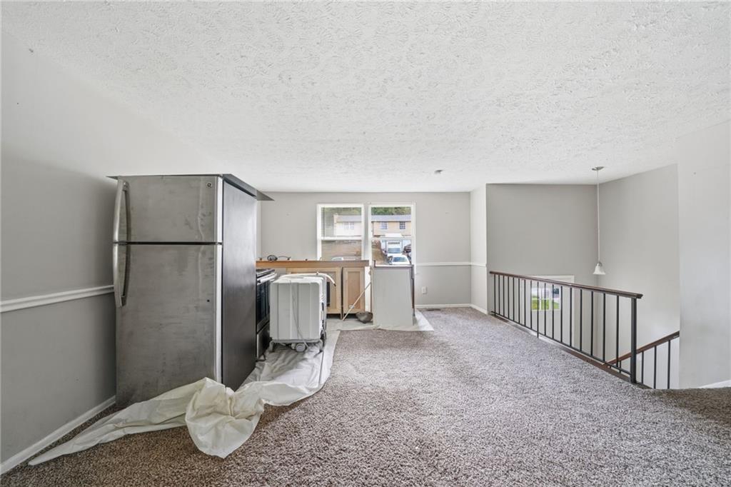 6865 Kimberly Mill Road Atlanta, GA 30349 - Photo 7 of 25 a view of a livingroom with a furniture