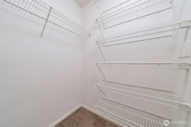 a view of a room with racks on the wall