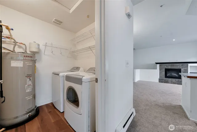 a view of a storage & utility room with washer and dryer
