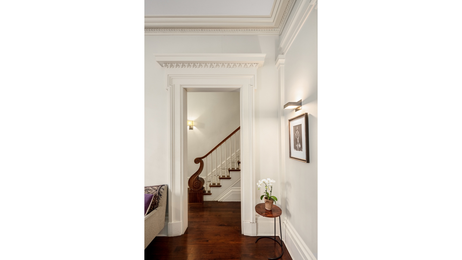 48 Jane Street Manhattan, NY 10014 - Photo 11 of 17 a view of a hallway with white walls and a white wall