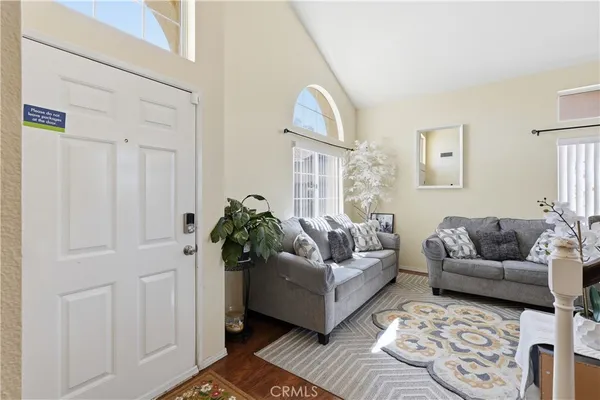 a living room with furniture and a couch