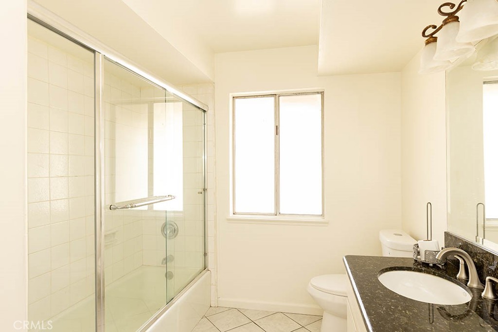 1837 Kelleher Place Placentia, CA 92870 - Photo 21 of 24 a bathroom with a granite countertop sink and a mirror