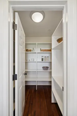 a kitchen with a table and chairs in it