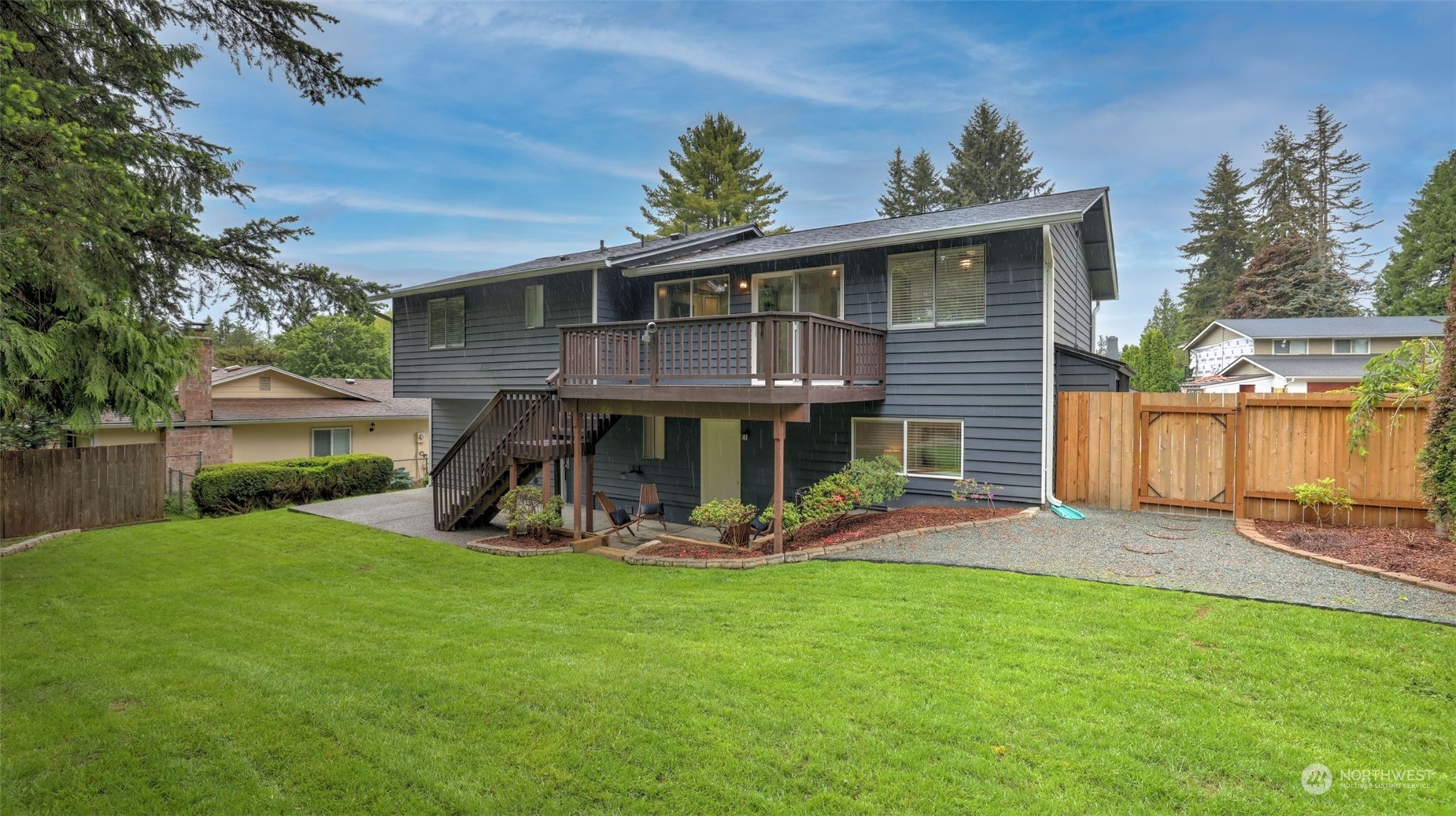 2424 170th Street Southeast Bothell, WA 98012 - Photo 36 of 40 a front view of a house with garden