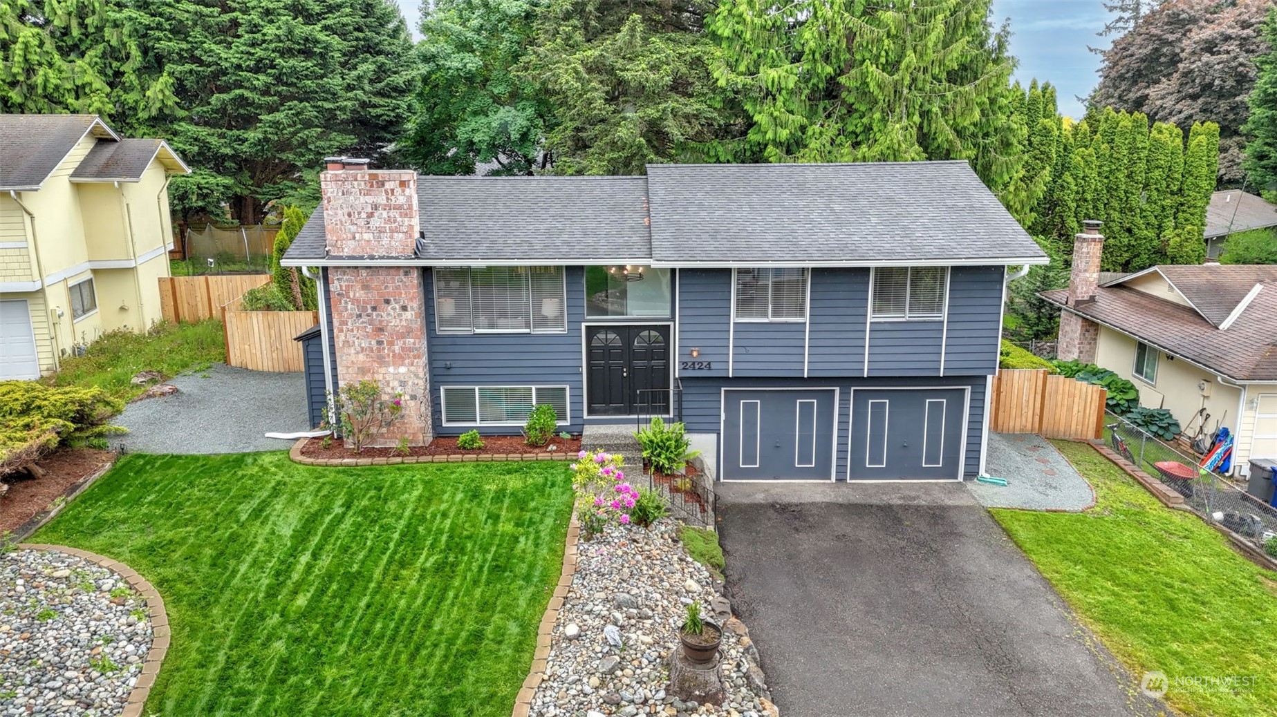 2424 170th Street Southeast Bothell, WA 98012 - Photo 4 of 40 front view of a house with a yard